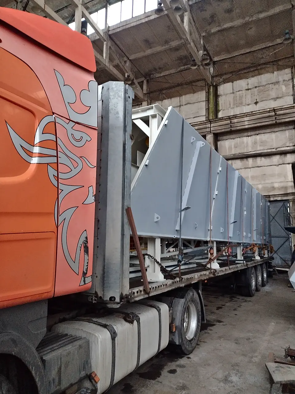 Aggregate bin section loaded on a truck for delivery
