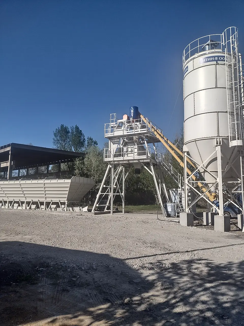 Side view of a commissioned concrete batching plant