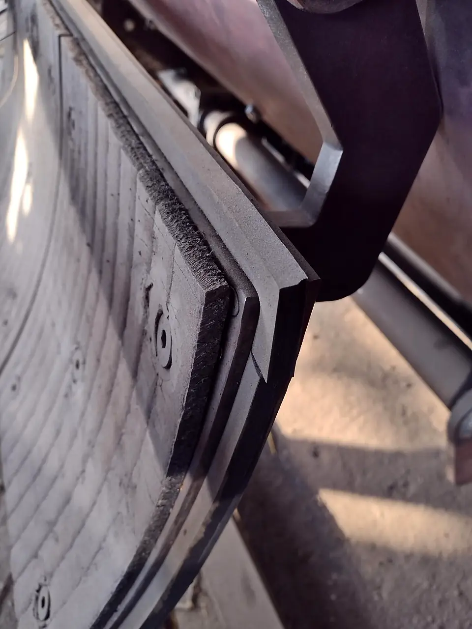 Close-up of a mixer blade and wear liner