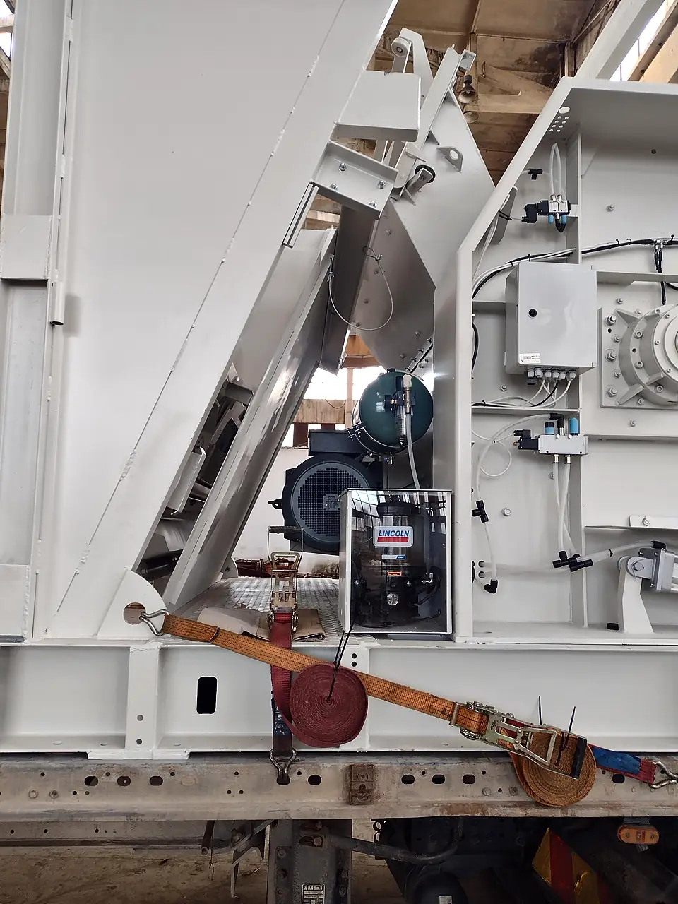 Mixer drive and electrics of a plant module secured for transport